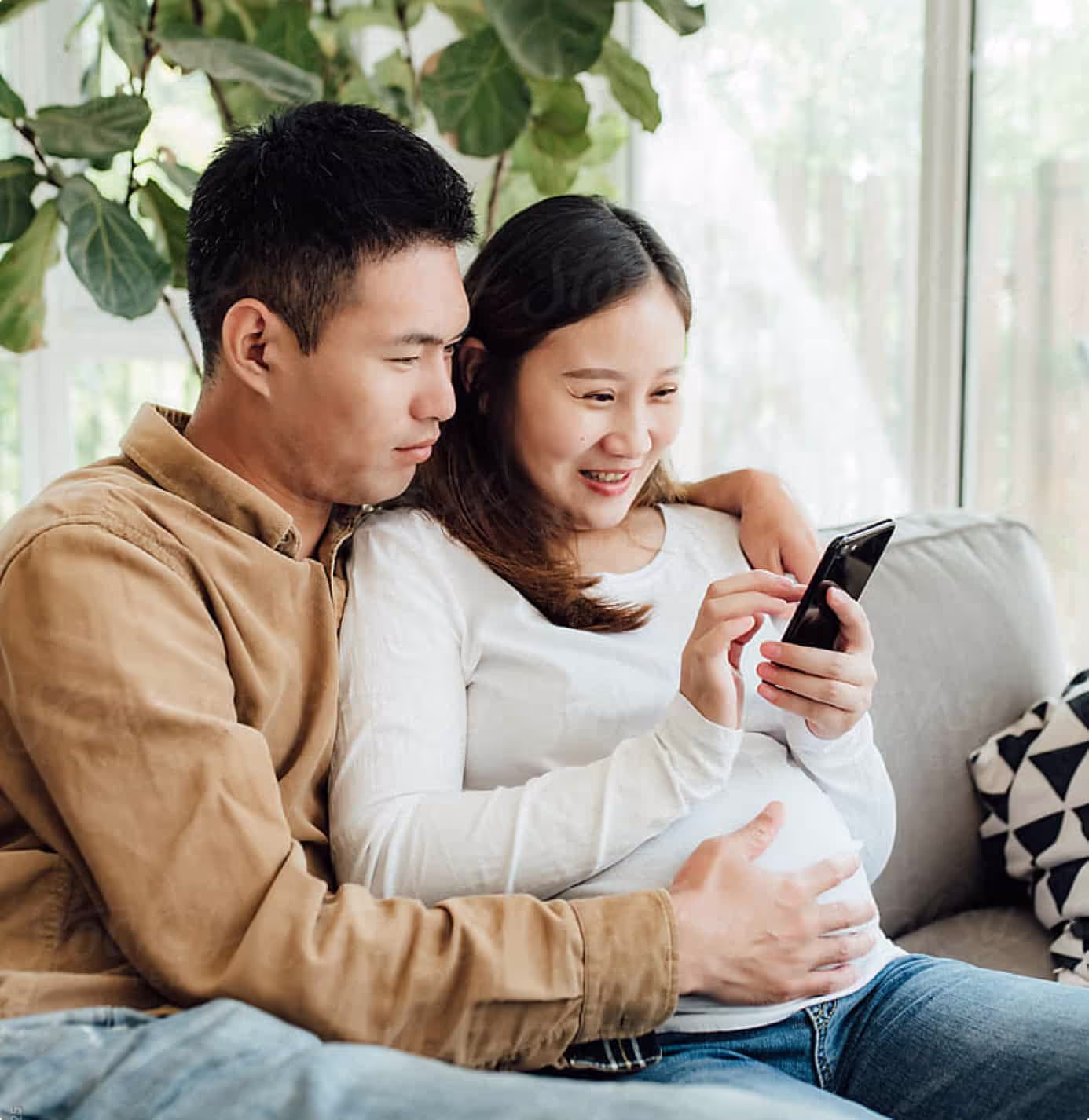 couple looking at their cell phones