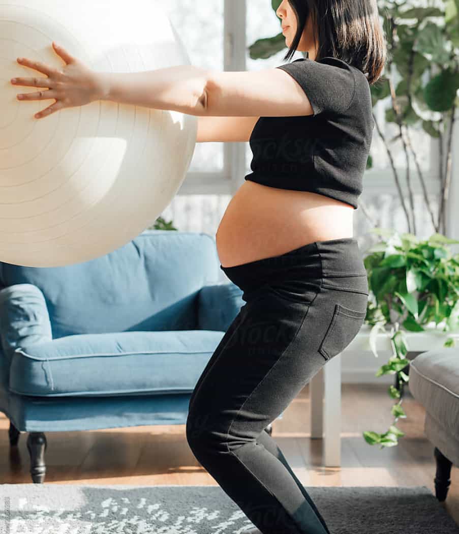 pregnant woman with exercise ball