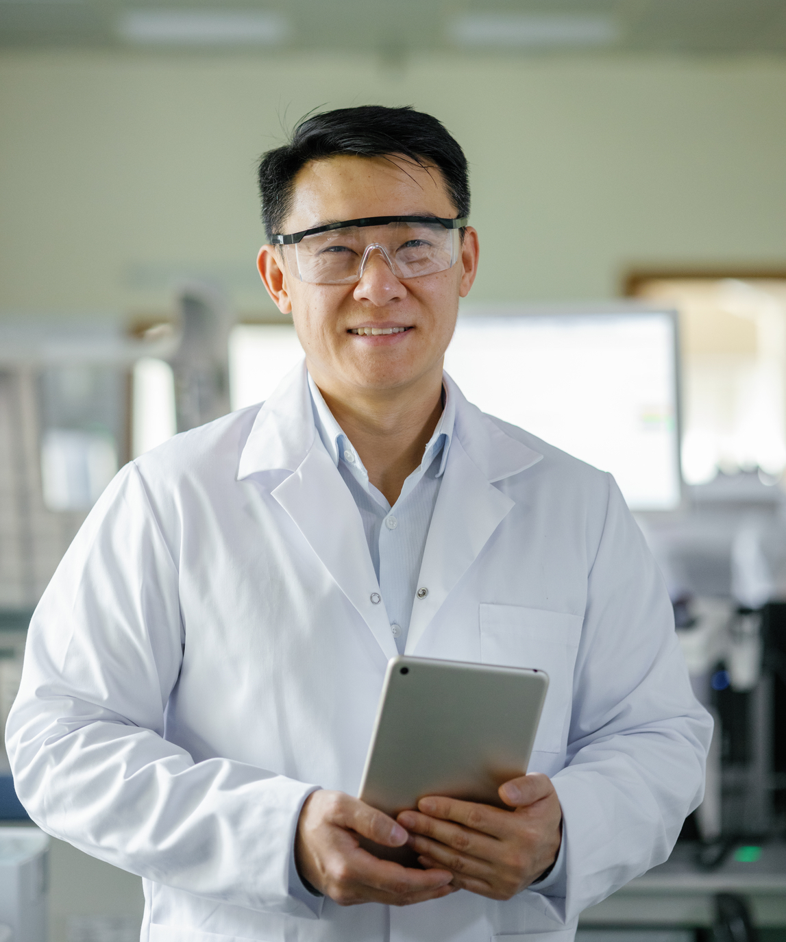 doctor smiling with tablet