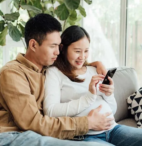 couple looking at their cell phones